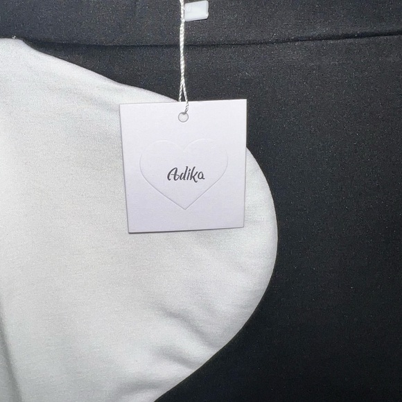 Brand new stretchy black mini skirt with white wave pattern - Picture 4 of 4